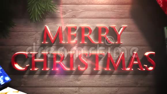 动画特写圣诞快乐文字礼品盒和绿色树枝在木头背景上视频的预览图