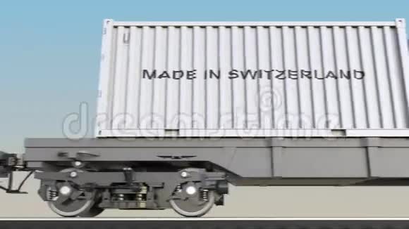 在SWITZERLAND标题下移动货物列车和集装箱铁路运输无缝回路4K夹视频的预览图