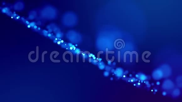 闪烁的蓝色魔法粒子在粘性液体中飞行和发光具有惊人的bokeh在4k的奇妙背景特写视频的预览图