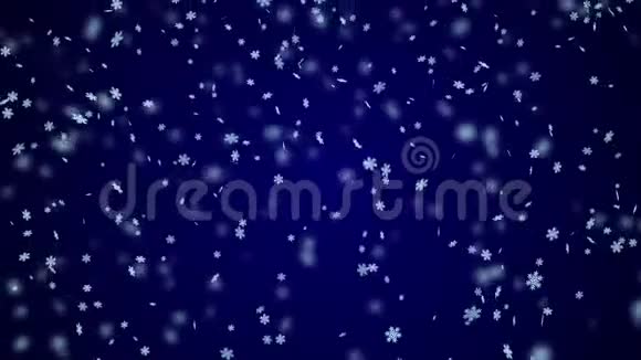 雪花落在蓝色背景上模糊视频的预览图