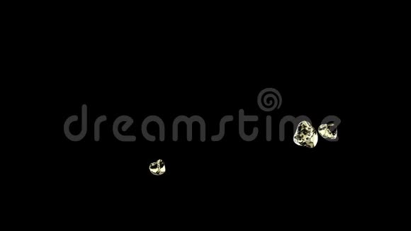 三滴金色的水滴碰撞在黑色上视频的预览图