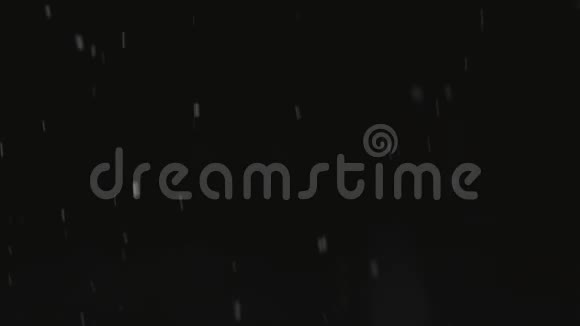 黑色背景下飘落的雪视频的预览图