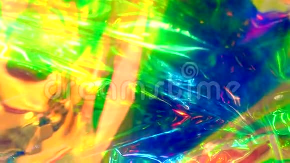 模糊的抽象彩虹全息箔背景视频的预览图