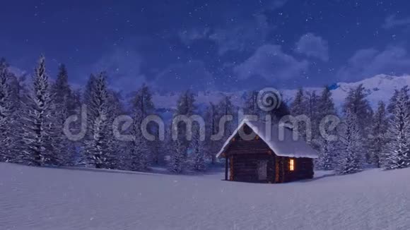 白雪皑皑的冬夜山间舒适的木屋视频的预览图