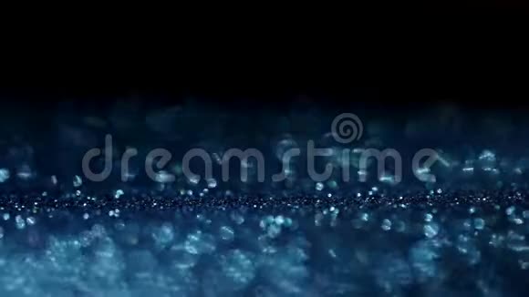 深蓝色闪光魔法背景离焦光和自由聚焦的地方为您的设计视频的预览图