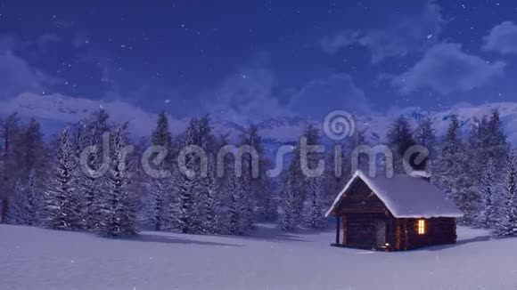 白雪覆盖的山屋冬夜视频的预览图