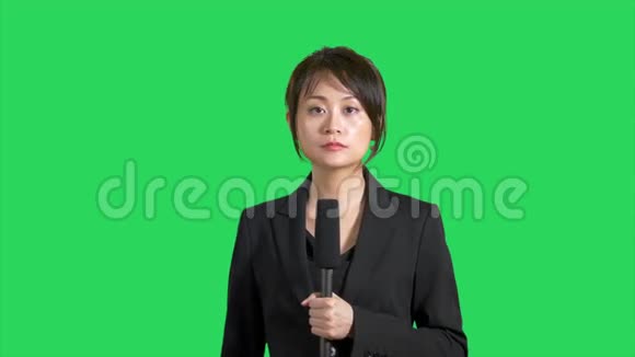 绿屏亚洲新闻记者视频的预览图