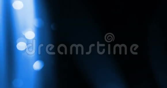抽象的蓝色辉光闪闪发光的粒子闪闪发光的效果节日喜庆新年快乐视频的预览图