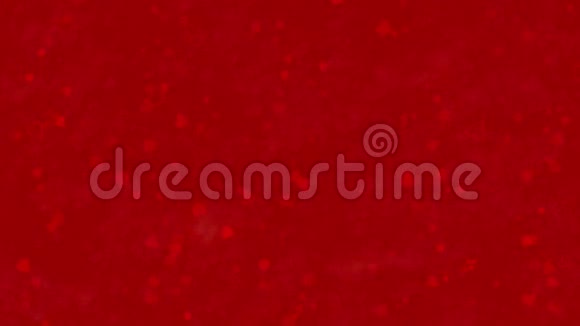 情人节快乐的中文文字由尘土构成在红色背景上横着变成尘土视频的预览图