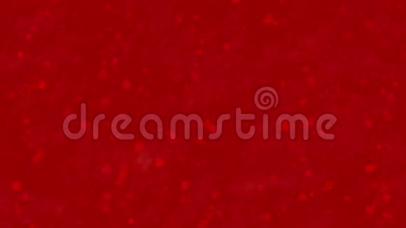 情人节快乐的俄文文字由尘土构成红色背景变成横向尘土视频的预览图
