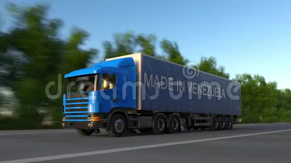 在拖车上加上MADEINVENEZUELA标题的加速货运半卡车视频的预览图