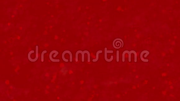 我爱你希腊文字由尘埃形成在红色背景上变成水平的尘埃视频的预览图