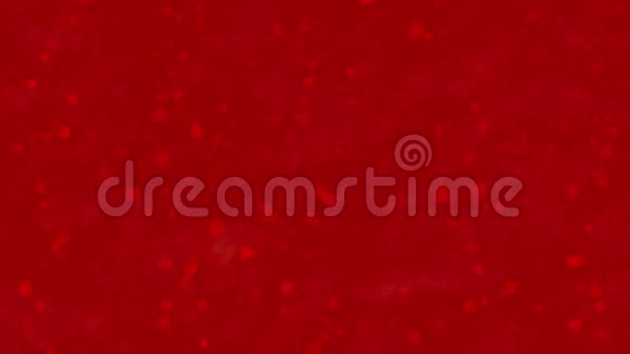 我爱你用荷兰语的文字伊克侯凡杰是由灰尘形成的在红色背景上变成水平的灰尘视频的预览图