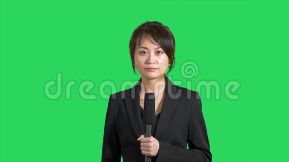 绿屏亚洲新闻记者视频的预览图