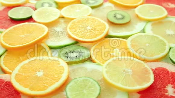 柑橘类水果片背景橘子柚子柠檬石灰柚子视频的预览图