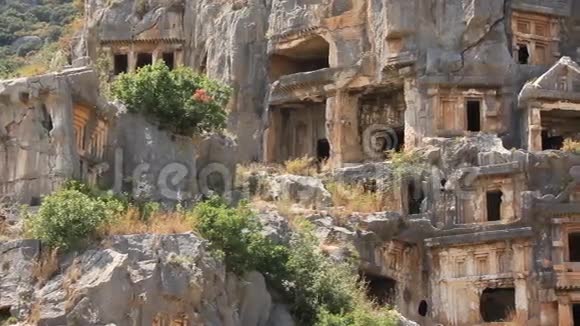 古代石城墓地的凿岩墓MiraDemre土耳其视频的预览图