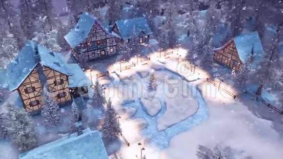 圣诞节冬夜白雪皑皑的小镇视频的预览图