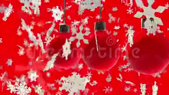 红色装饰物红色雪花慢慢飘落视频的预览图