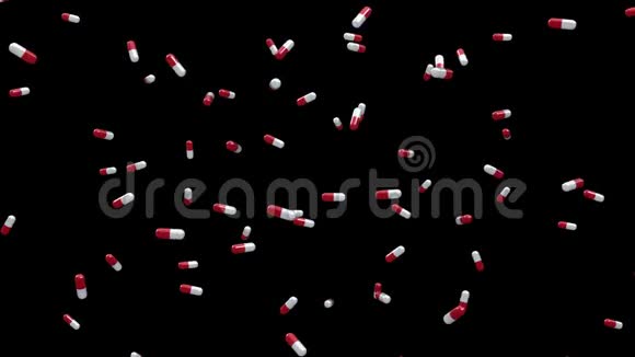 漂浮在黑色背景下的红白药丸循环视频的预览图