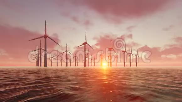 日落时分风力发电机在海洋中形成轮廓视频的预览图