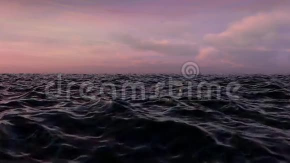 海洋在日落时飞过视频的预览图