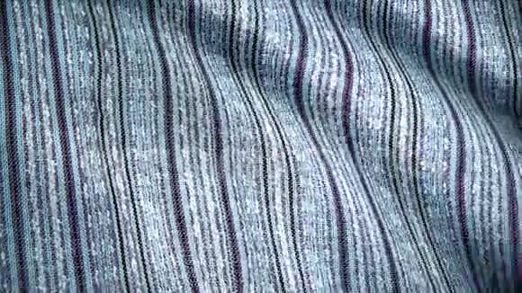 背景质地柔软的波纹条纹织物纺织材料无缝环彩色布的背景视频的预览图