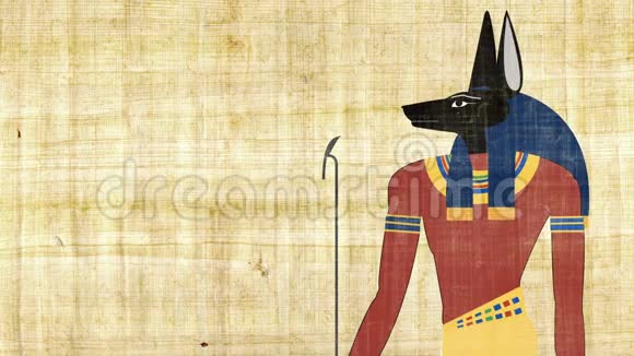 埃及死亡之神阿努比斯在纸莎草背景下视频的预览图