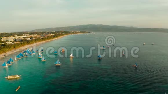 菲律宾长滩岛热带海滩和帆船视频的预览图