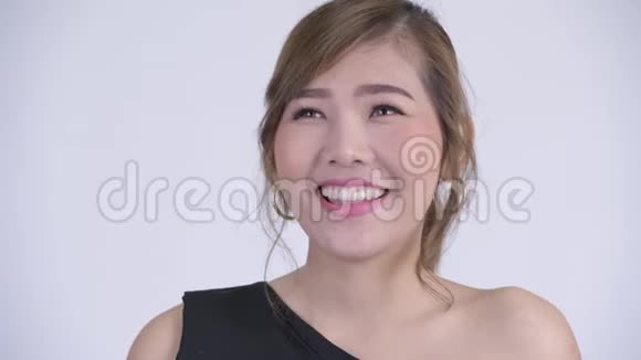 快乐年轻美丽的亚洲女人的脸视频的预览图