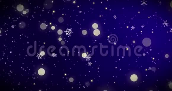 金色的纸屑和bokeh灯在蓝色的圣诞背景上视频的预览图
