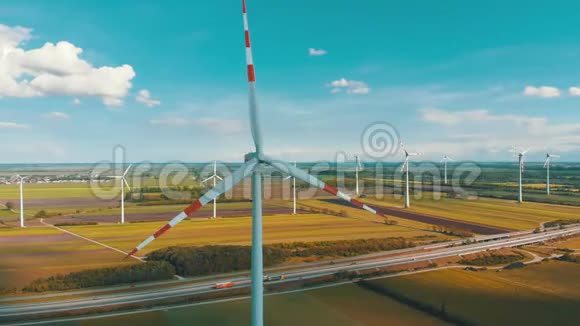 田间风力涡轮机农场的鸟瞰图奥地利能源生产的Drone观点视频的预览图