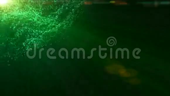 绿色粒子背景无缝环圣诞节假期概念视频的预览图