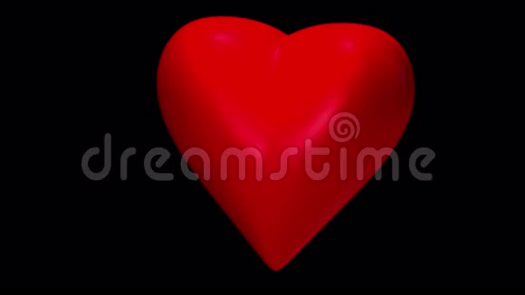 心脏在黑色背景下的粒子表现阿尔法通道视频回路视频的预览图