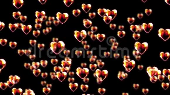 明亮的心泡泡浮在黑色的背景上视频的预览图