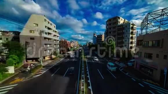 东京Kanpachi大道的一条汽车街的时间推移白天的大镜头倾斜视频的预览图
