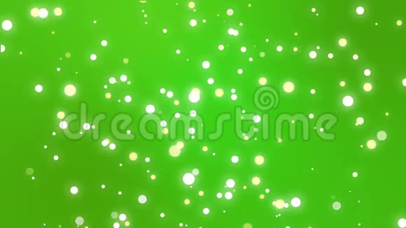 在绿色渐变背景下带有火花粒子的圣诞背景视频的预览图