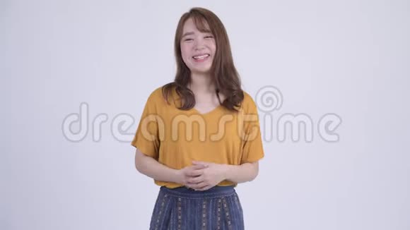 快乐年轻美丽的亚洲女人视频的预览图