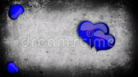 一颗蓝色的心在灰色的混凝土背景上有藤蔓视频的预览图