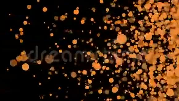 黑色背景循环动画中的橙色粒子视频的预览图