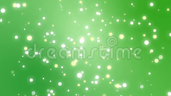 闪闪发光的粒子穿过绿色背景视频的预览图