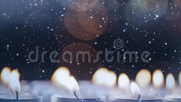 蜡烛与降雪相结合视频的预览图