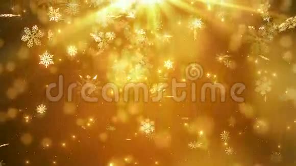 金色美丽飘落的雪花视频的预览图