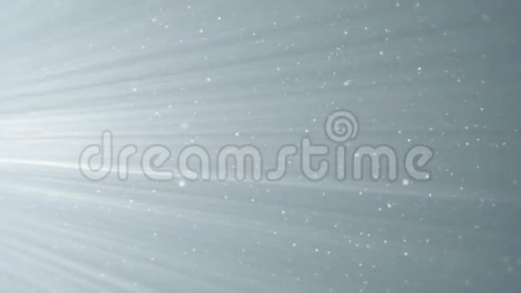 商业上的白色明亮的闪光bokeh灰尘抽象的背景环视频的预览图