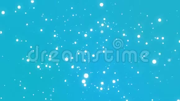 白色的雪花在蓝绿色的背景下飘落下来视频的预览图
