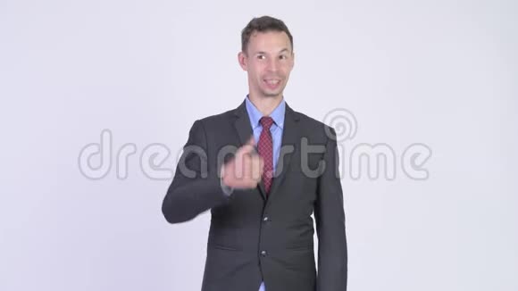 一张快乐商人竖起大拇指的摄影棚视频的预览图
