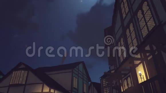 夜空下古老的中世纪房子视频的预览图