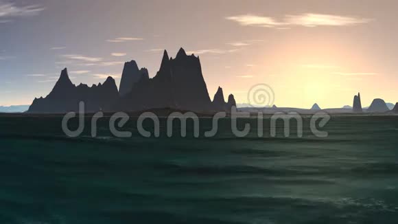 海洋中一个岩石岛上的日出视频的预览图