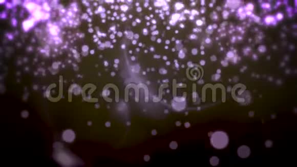 抽象紫色bokeh和颗粒掉落假期有闪亮的背景视频的预览图