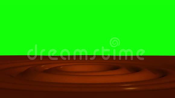 绿色屏幕上带有焦点效应的巧克力滴滴1视频的预览图