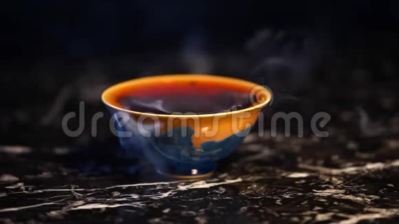 黑热中式茶杯大理石背景视频的预览图